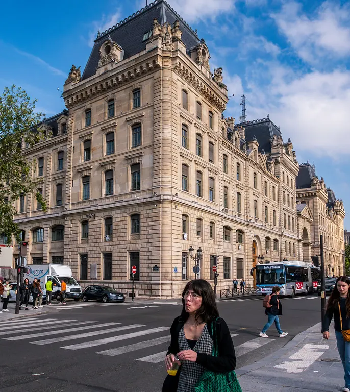 Historic Sorbonne building on a Paris street corner